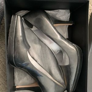 Grey Tahari pumps.